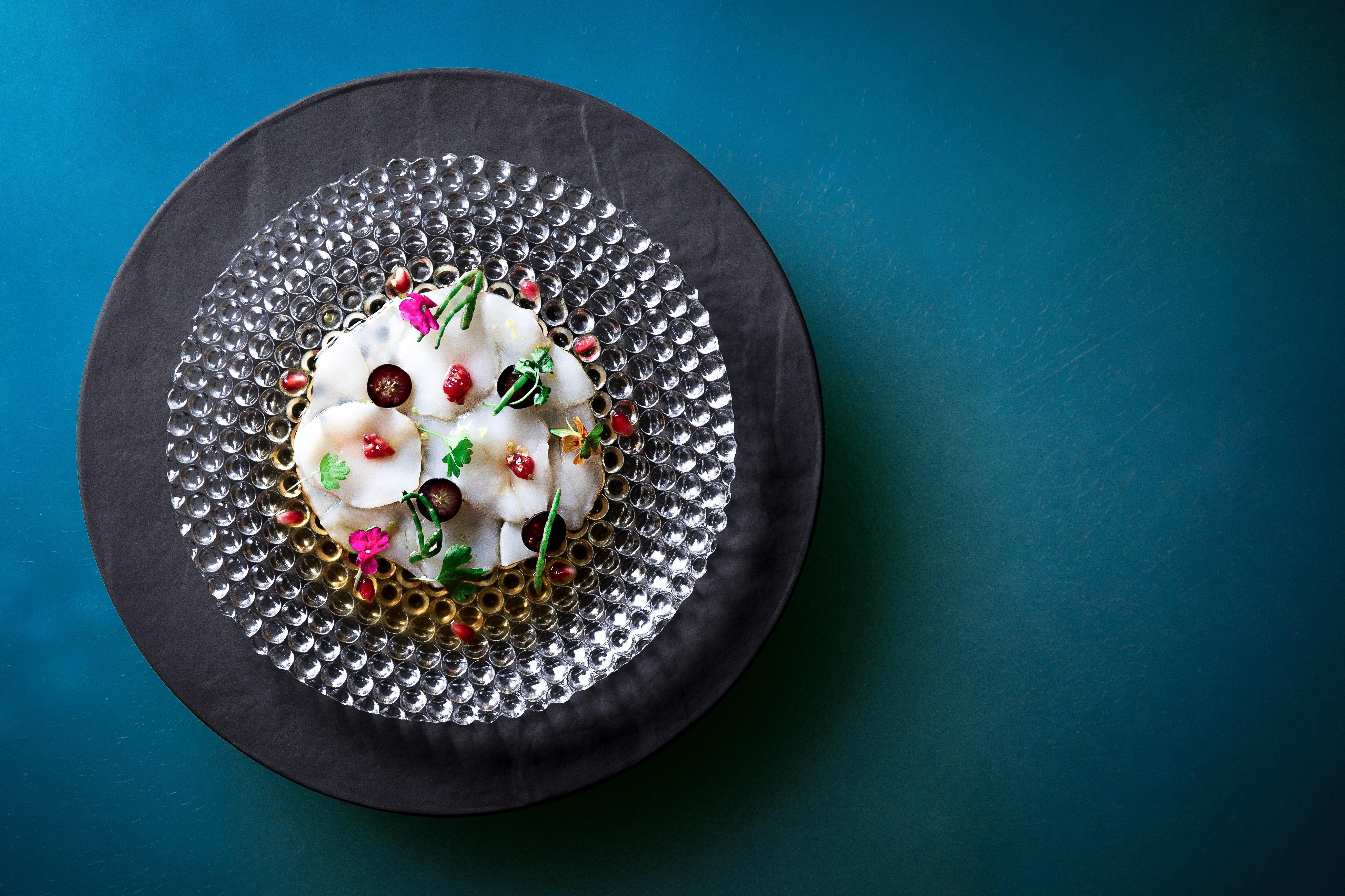 โรงแรมคิมป์ตัน เอพิก ไมอามี ภายนอก รูปภาพ A dish by Chef Nuno Leal at the restaurant